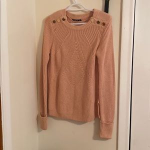 Pink knitted sweater